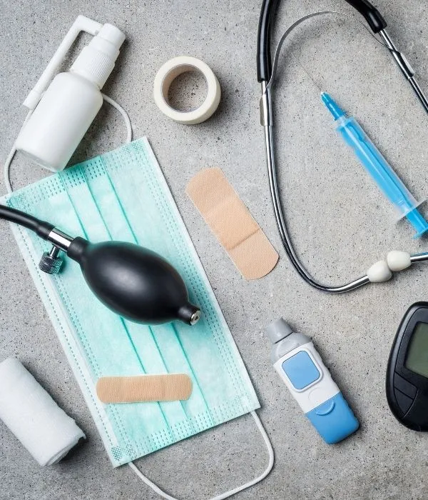 Medical supplies: stethoscope, blood pressure monitor, masks, thermometer and bandages